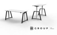 Białe pomieszczenie z białymi stołami zero G i logiem B-Group w rogu zdjęcie 1